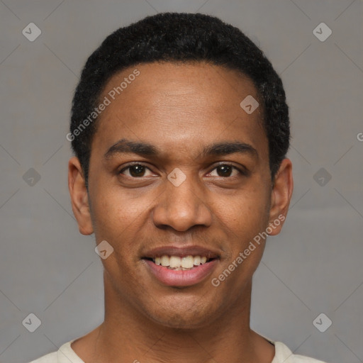 Joyful black young-adult male with short  black hair and brown eyes