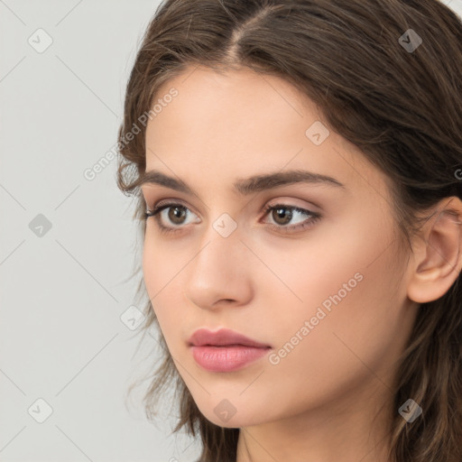 Neutral white young-adult female with long  brown hair and brown eyes