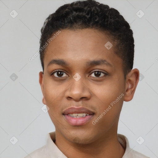 Joyful black young-adult male with short  brown hair and brown eyes