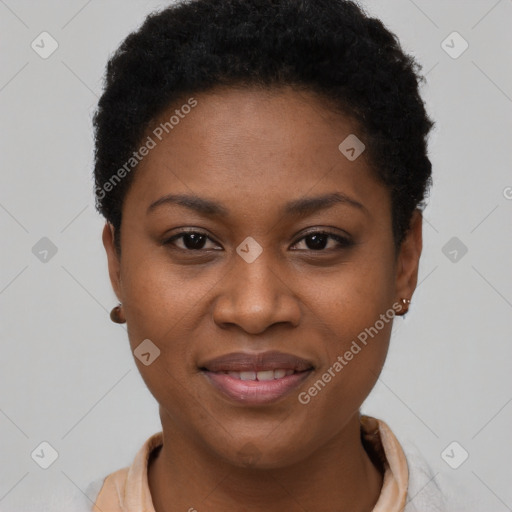 Joyful black young-adult female with short  brown hair and brown eyes