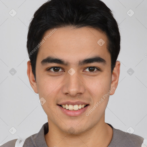 Joyful latino young-adult male with short  black hair and brown eyes