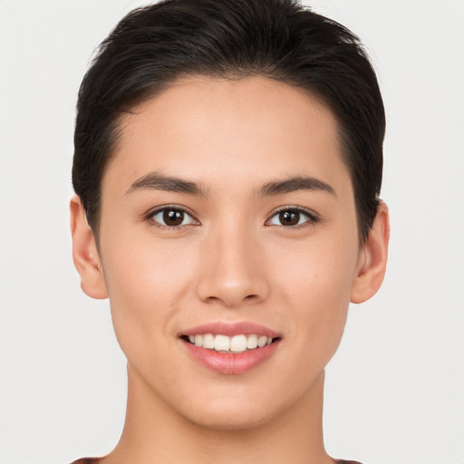 Joyful white young-adult female with short  brown hair and brown eyes