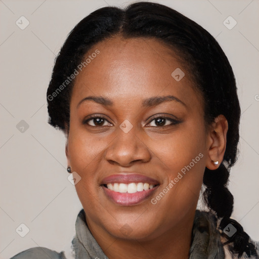 Joyful black young-adult female with medium  black hair and brown eyes