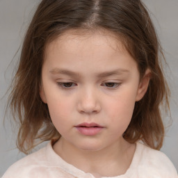 Neutral white child female with medium  brown hair and brown eyes