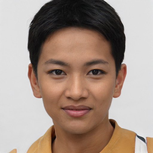 Joyful asian young-adult female with short  black hair and brown eyes