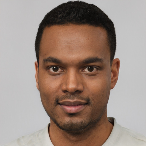Neutral black young-adult male with short  black hair and brown eyes