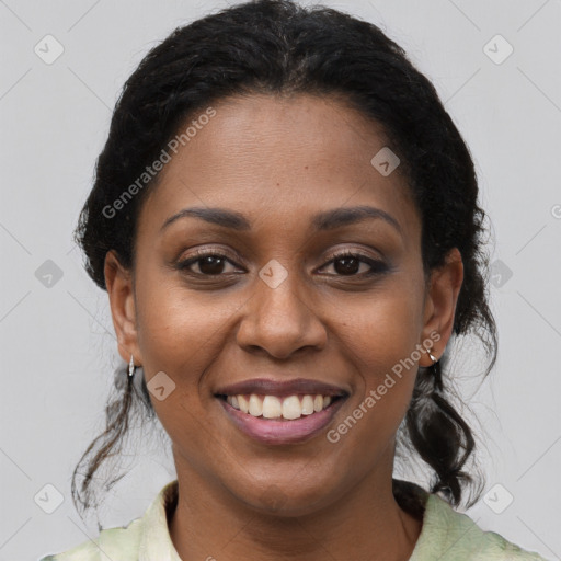 Joyful black young-adult female with medium  brown hair and brown eyes