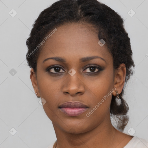 Neutral black young-adult female with short  brown hair and brown eyes