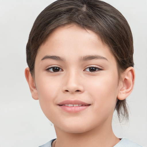 Joyful white child female with medium  brown hair and brown eyes