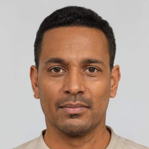 Neutral black young-adult male with short  black hair and brown eyes