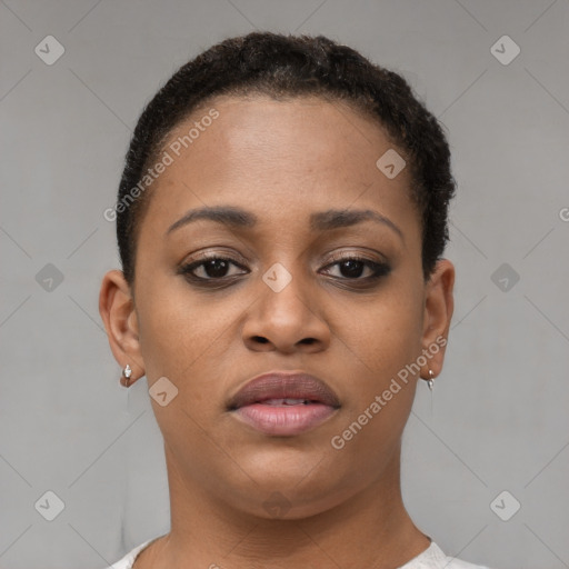 Joyful black young-adult female with short  brown hair and brown eyes