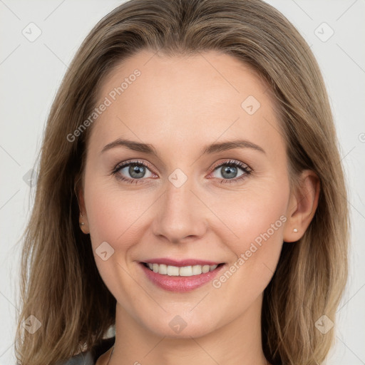 Joyful white young-adult female with long  brown hair and grey eyes