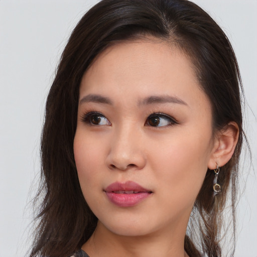 Neutral asian young-adult female with long  brown hair and brown eyes
