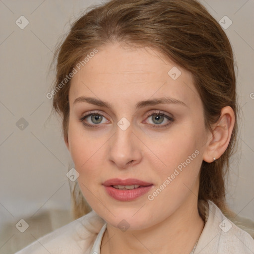 Joyful white young-adult female with medium  brown hair and blue eyes