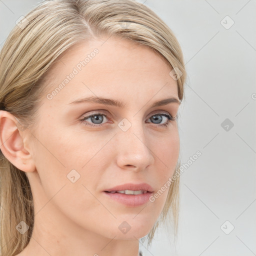 Neutral white young-adult female with long  brown hair and blue eyes