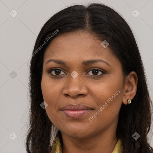 Joyful black young-adult female with long  brown hair and brown eyes