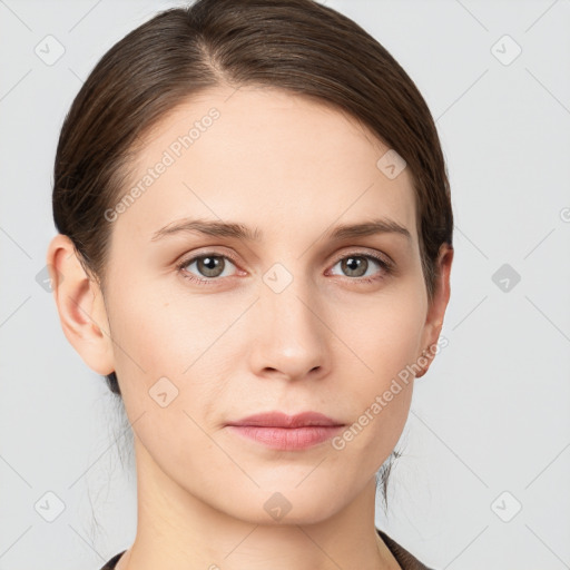 Neutral white young-adult female with short  brown hair and brown eyes