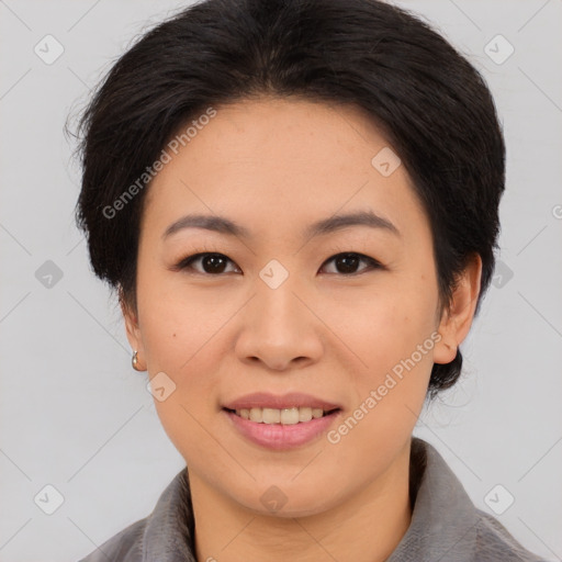 Joyful asian young-adult female with medium  brown hair and brown eyes