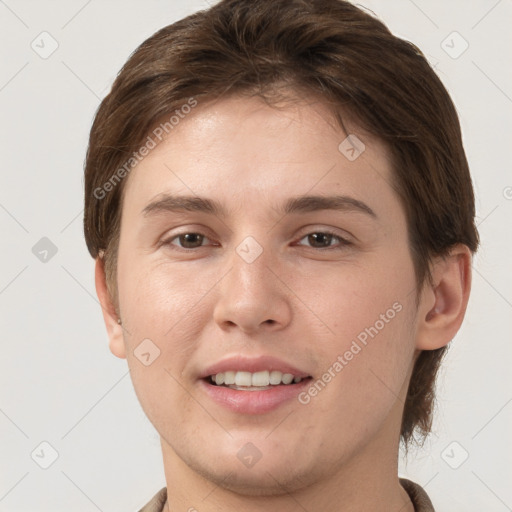 Joyful white young-adult female with short  brown hair and grey eyes