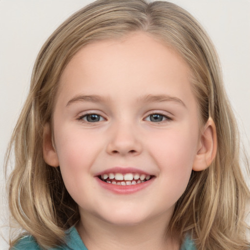 Joyful white child female with medium  brown hair and blue eyes