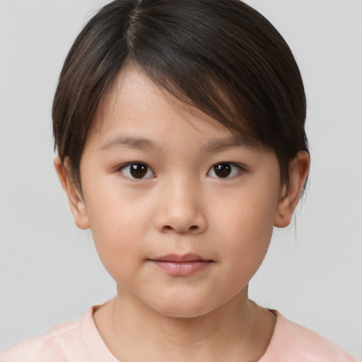 Neutral white child female with short  brown hair and brown eyes
