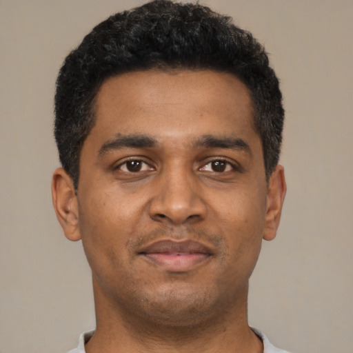 Neutral black young-adult male with short  black hair and brown eyes