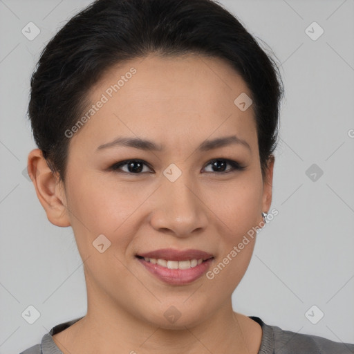 Joyful asian young-adult female with short  brown hair and brown eyes