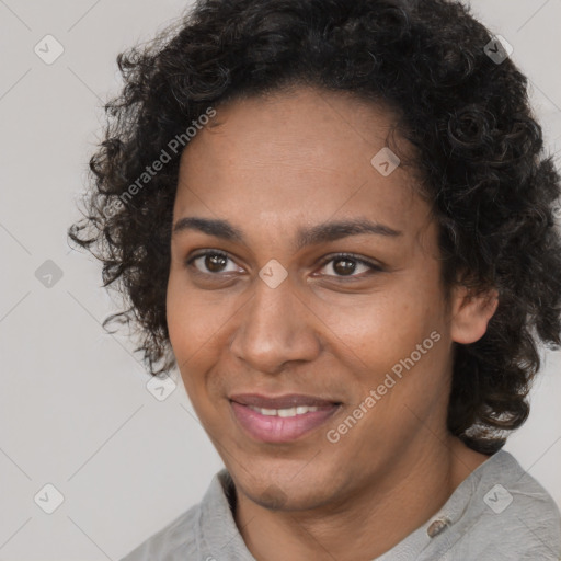 Joyful black young-adult female with short  brown hair and brown eyes