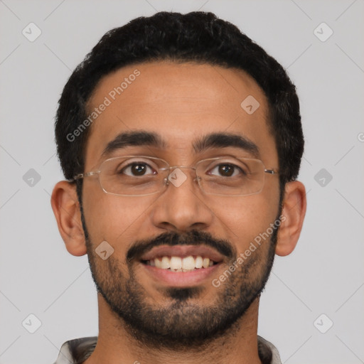 Joyful latino young-adult male with short  black hair and brown eyes