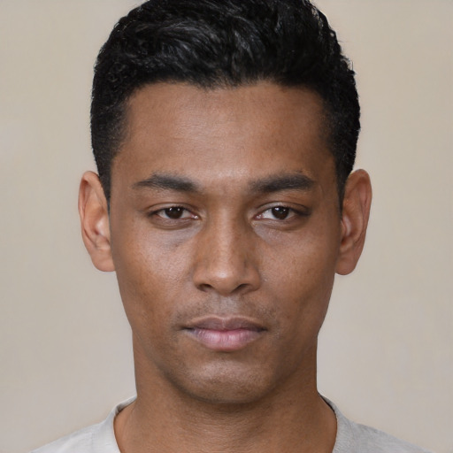 Neutral latino young-adult male with short  black hair and brown eyes