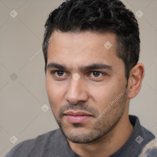 Neutral white young-adult male with short  black hair and brown eyes