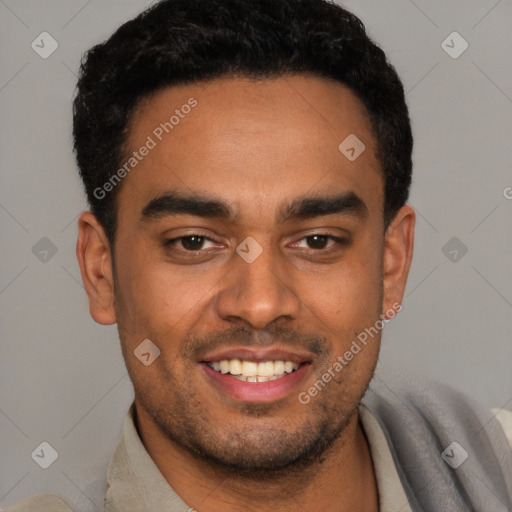 Joyful latino young-adult male with short  black hair and brown eyes