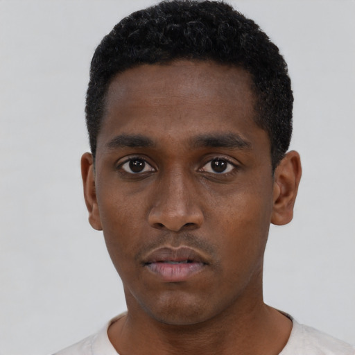 Neutral black young-adult male with short  black hair and brown eyes