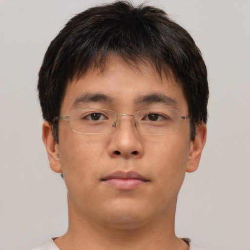 Neutral asian young-adult male with short  brown hair and brown eyes