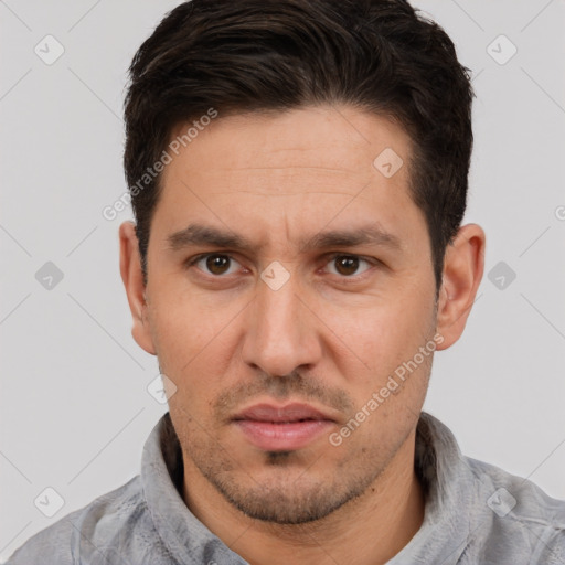 Neutral white adult male with short  brown hair and brown eyes