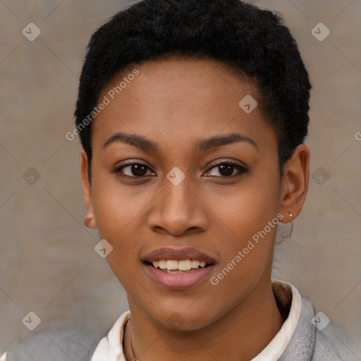 Joyful black young-adult female with short  black hair and brown eyes