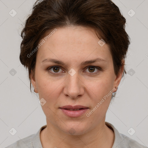 Joyful white adult female with short  brown hair and brown eyes