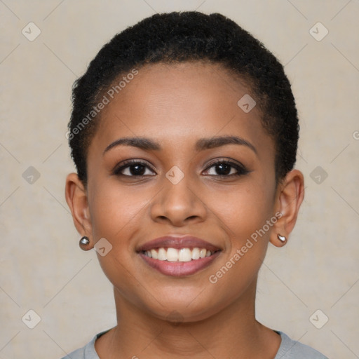 Joyful black young-adult female with short  brown hair and brown eyes