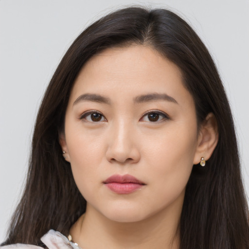 Neutral asian young-adult female with long  brown hair and brown eyes