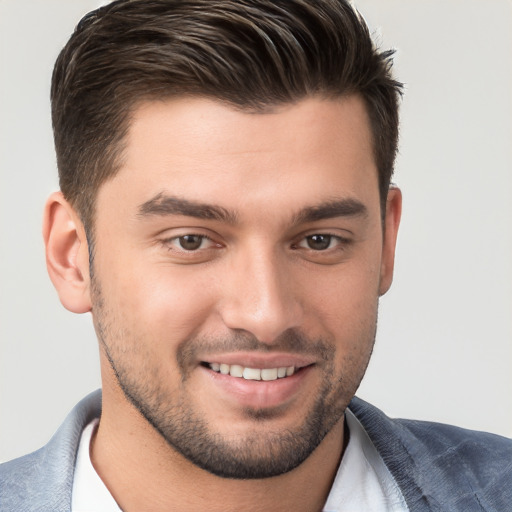 Joyful white young-adult male with short  brown hair and brown eyes