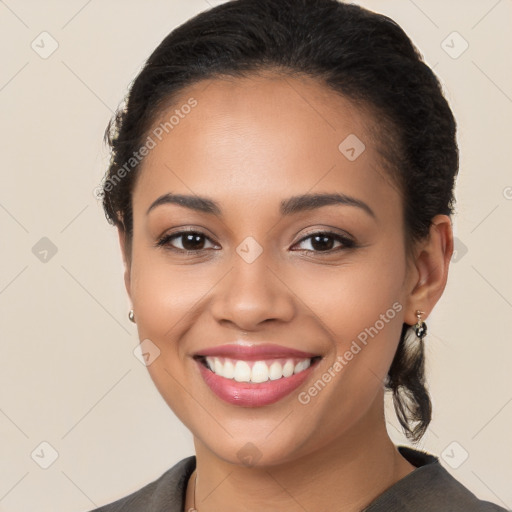 Joyful latino young-adult female with short  brown hair and brown eyes