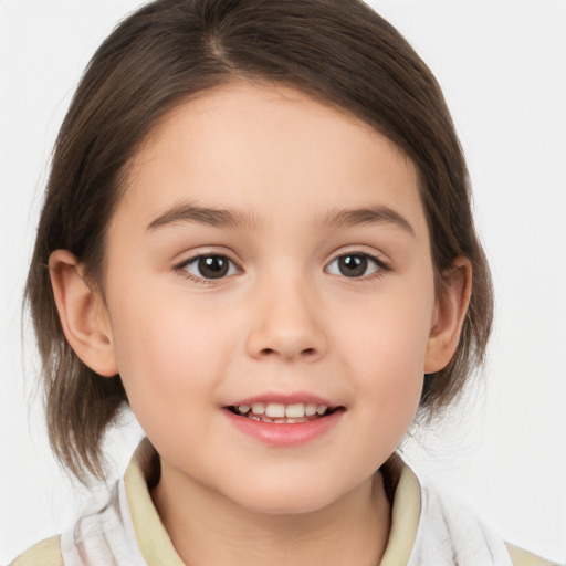 Joyful white child female with medium  brown hair and brown eyes