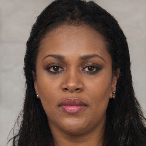 Neutral black young-adult female with long  black hair and brown eyes