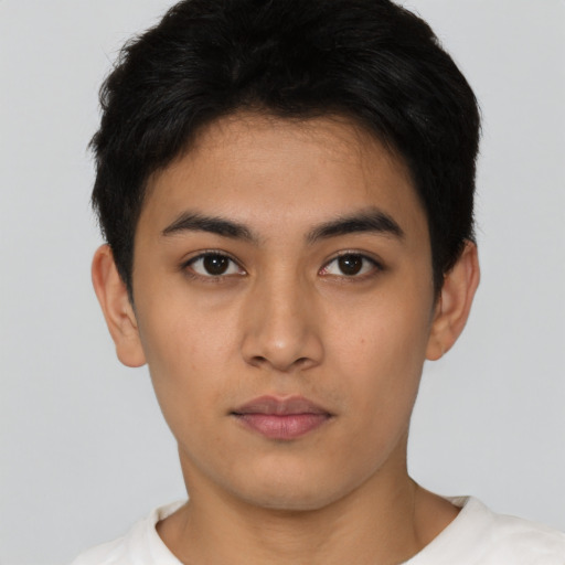 Neutral asian young-adult male with short  black hair and brown eyes