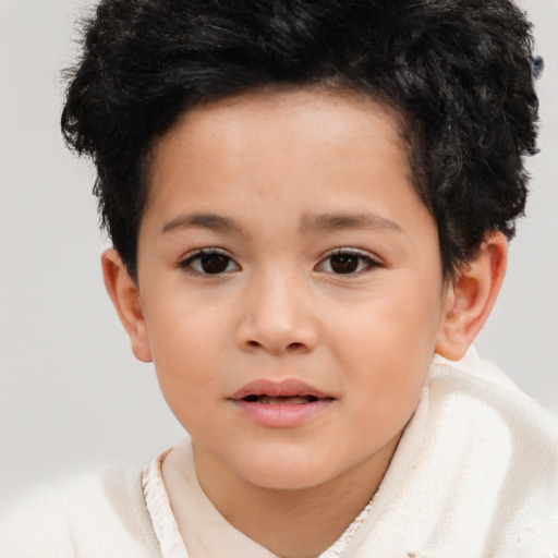 Joyful asian child male with short  brown hair and brown eyes