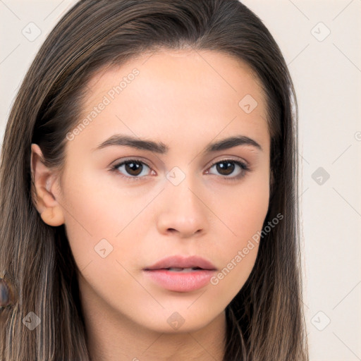 Neutral white young-adult female with long  brown hair and brown eyes