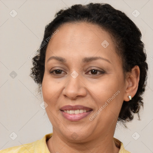 Joyful white adult female with short  brown hair and brown eyes