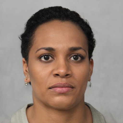 Neutral black young-adult female with short  brown hair and brown eyes