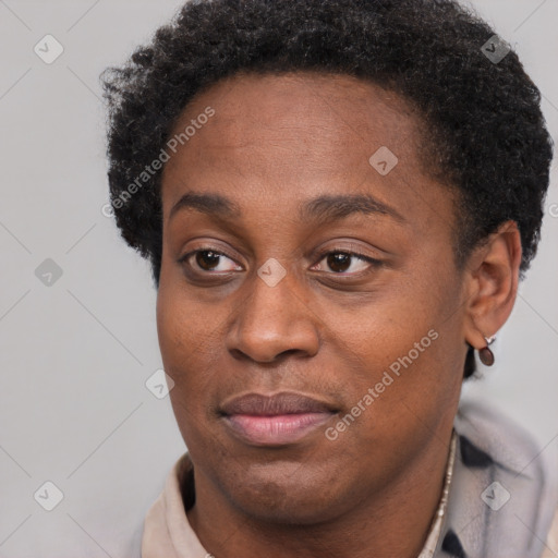 Joyful black adult female with short  brown hair and brown eyes