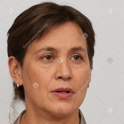 Joyful white adult female with short  brown hair and brown eyes